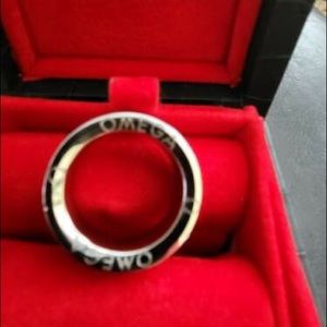 Omega Watch Co Men’s Ring Sterling Silver size 9 complete with all boxes..